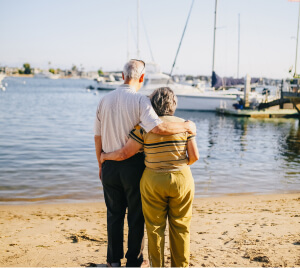 Elderly Couple By the Beach